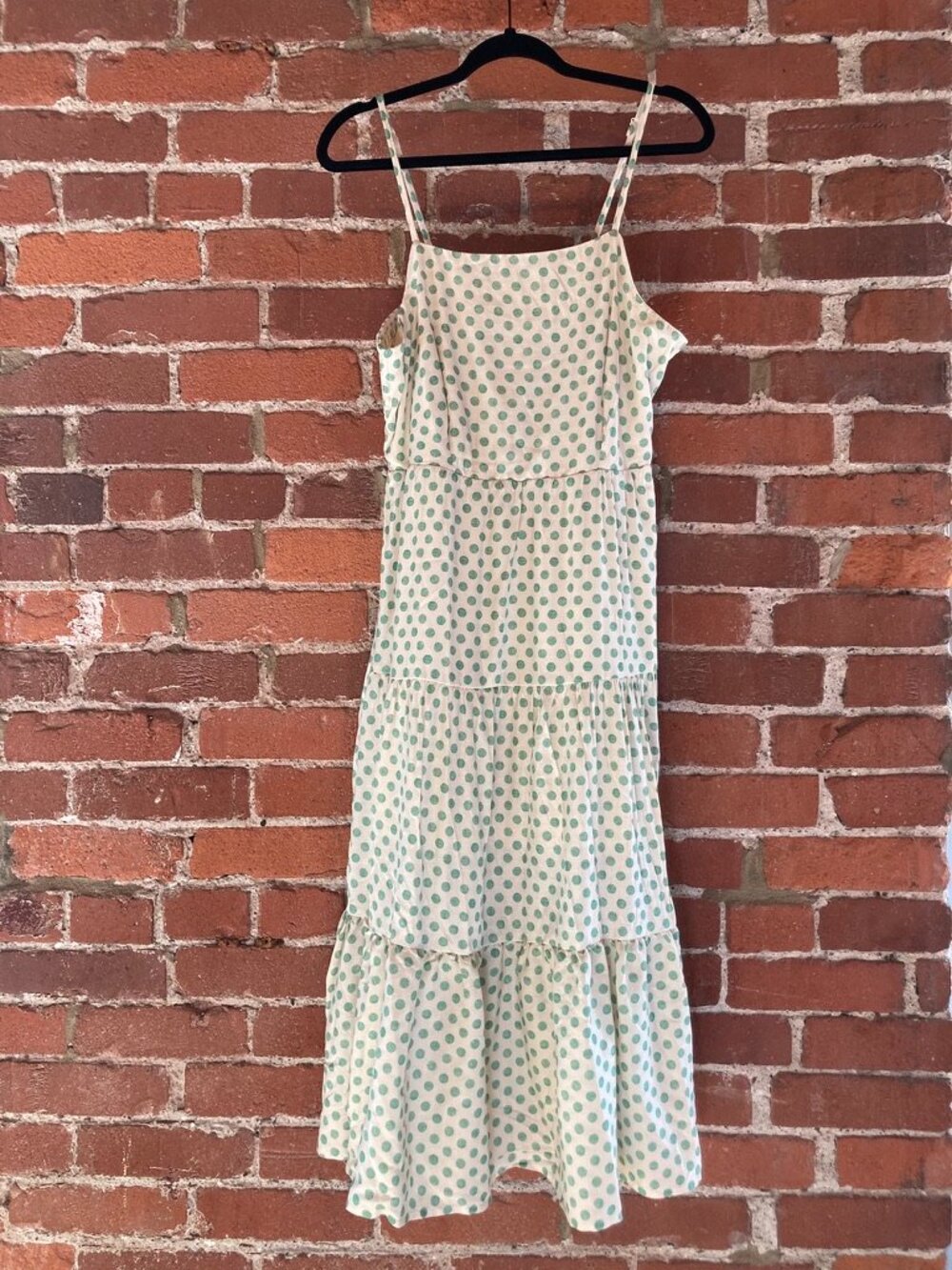Cream sundress with light green polka dots